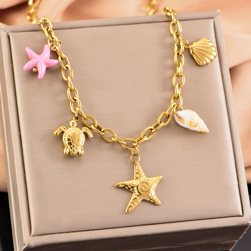starfish turtle conch gold necklace