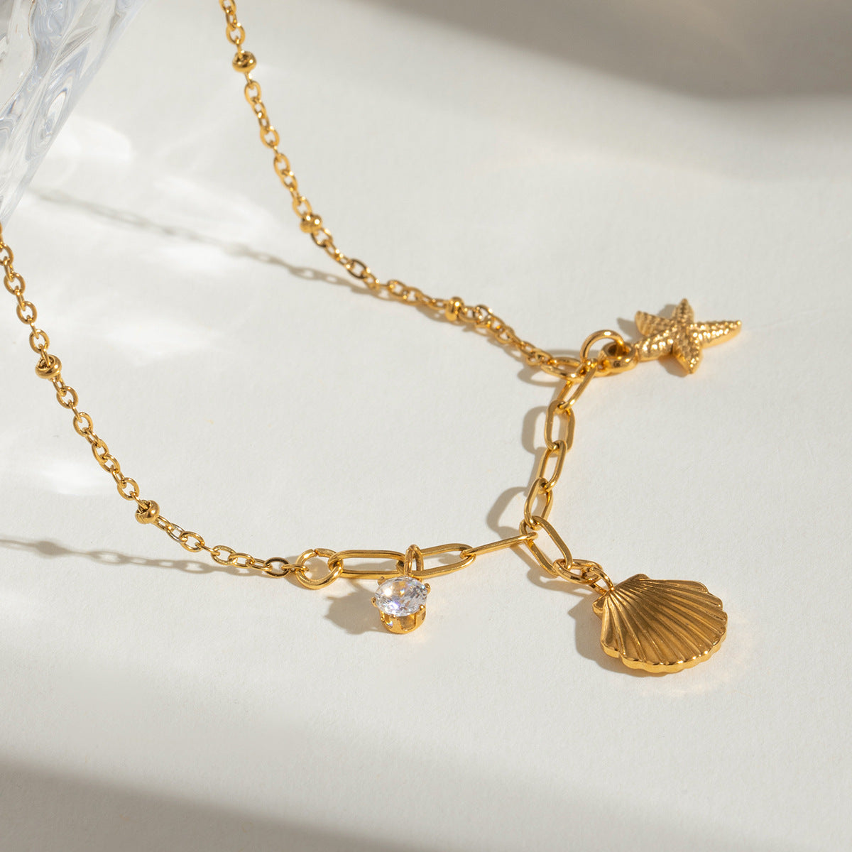 Small starfish shell zircon necklace