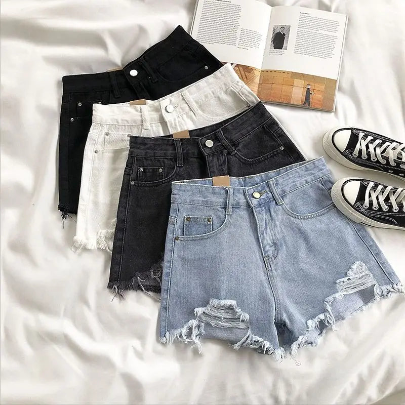 Pocket Tassel Perforated Denim Shorts Female