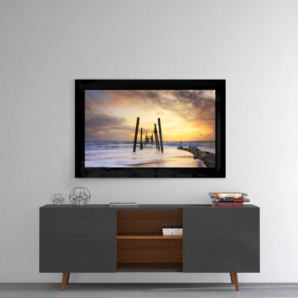 Old Pier Pilings Sunset Glass Wall Art