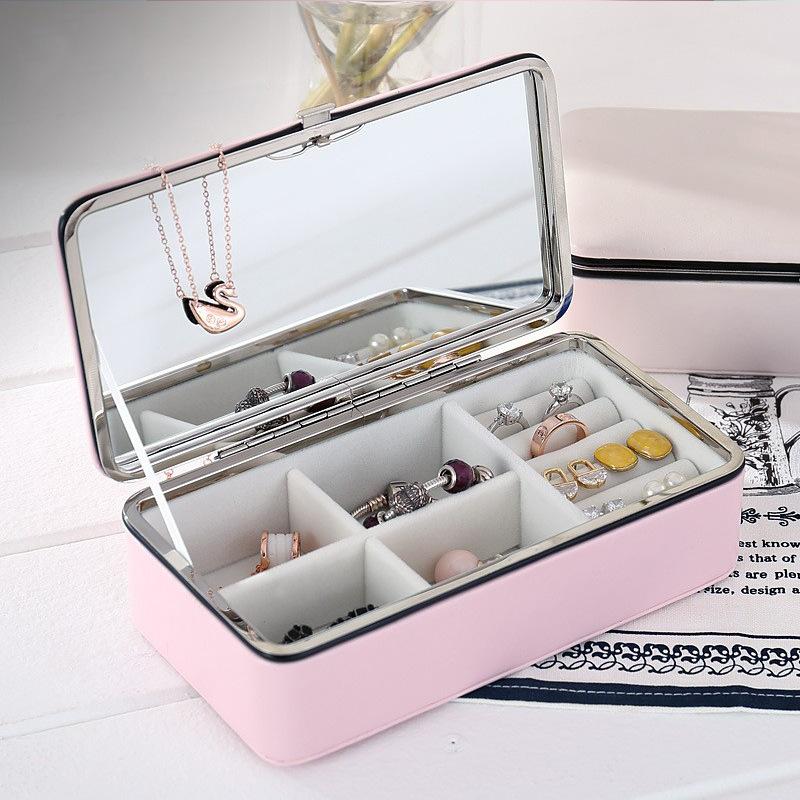 Leather makeup mirror for travel jewelry storage