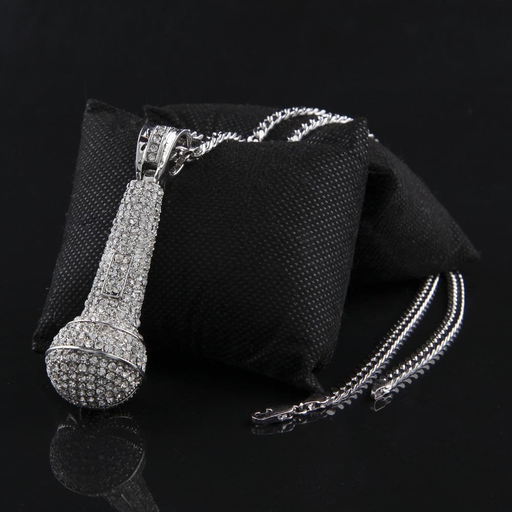 Hip-hop diamond-encrusted microphone necklaces.