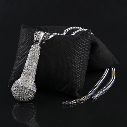 Hip-hop diamond-encrusted microphone necklaces.