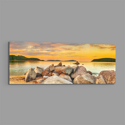 Boulder Pile Golden Sunset Bay Glass Wall Art