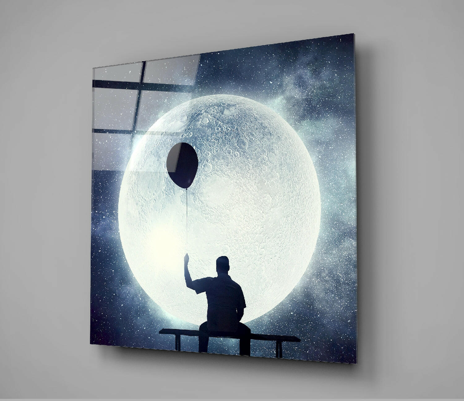 Man on Bench Holding Balloon Moon Glass Wall Art