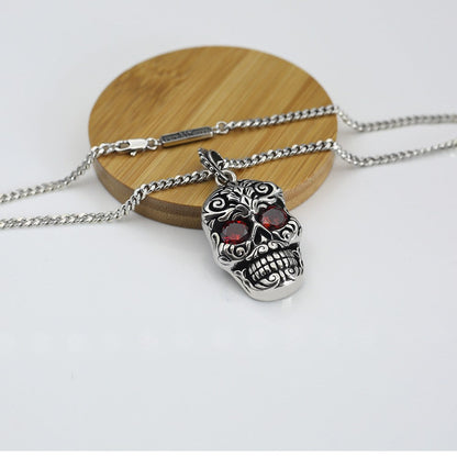 Retro Baroque garnet eye skull pendant