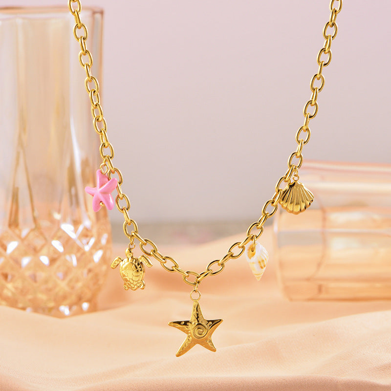 starfish turtle conch gold necklace