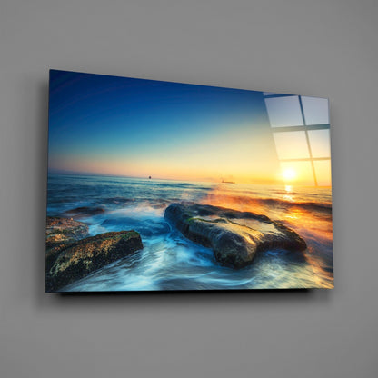 Silky Waves Over Boulders Glass Wall Art
