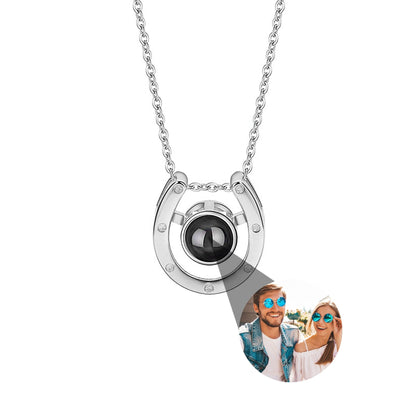 A horseshoe shaped projection necklace with customizable photos Valentine&