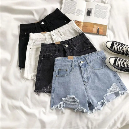 Pocket Tassel Perforated Denim Shorts Female