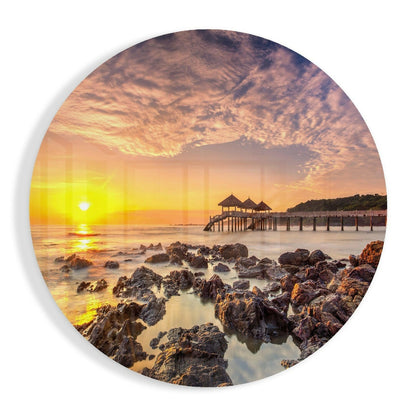 Round Golden Pier Sunrise Over Rocks Glass Wall Art