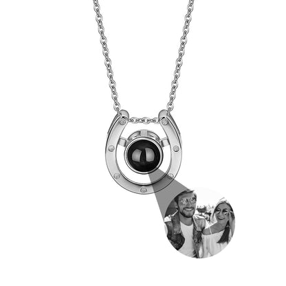 A horseshoe shaped projection necklace with customizable photos Valentine&