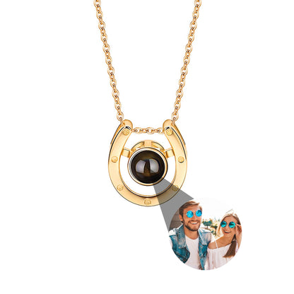 A horseshoe shaped projection necklace with customizable photos Valentine&