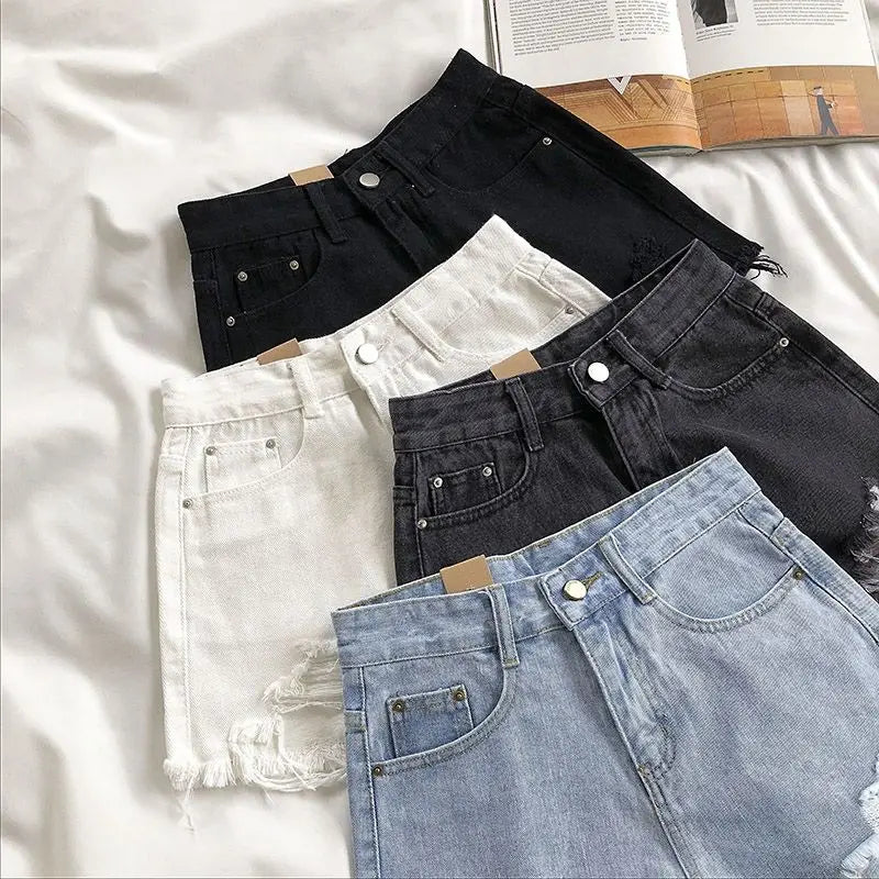 Pocket Tassel Perforated Denim Shorts Female