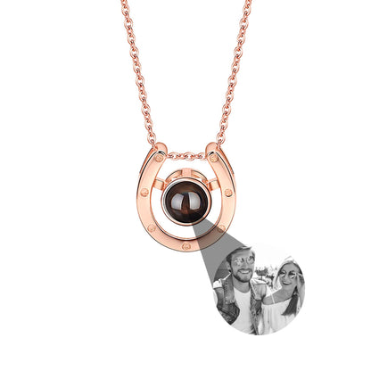 A horseshoe shaped projection necklace with customizable photos Valentine&