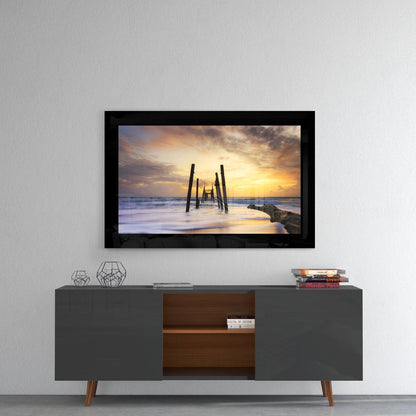 Old Pier Pilings Sunset Glass Wall Art