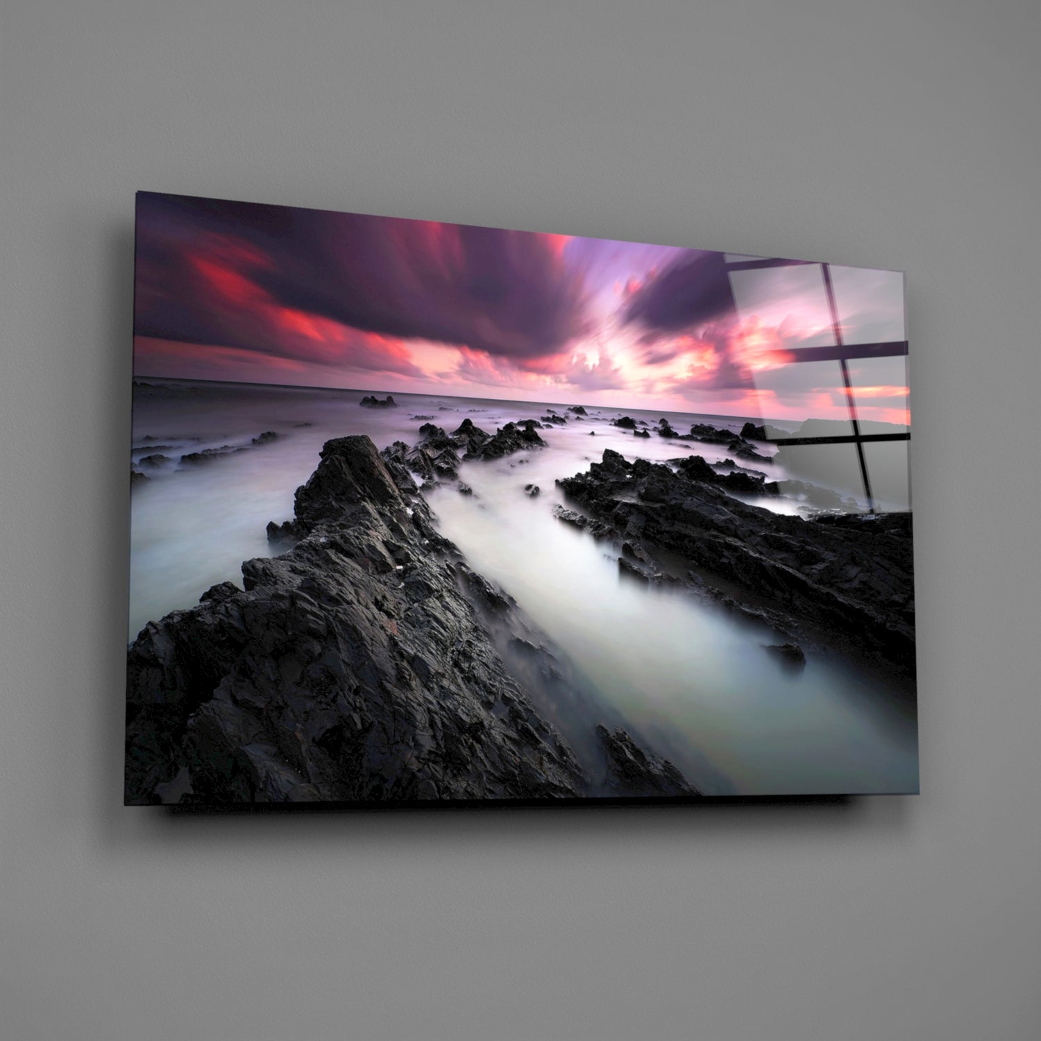 Crimson Sky Over Black Rocks Glass Wall Art