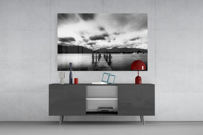 Dramatic Clouds Over Lake Jetty Glass Wall Art