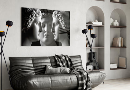 Black and White Mirrored Statue Faces Glass Wall Art